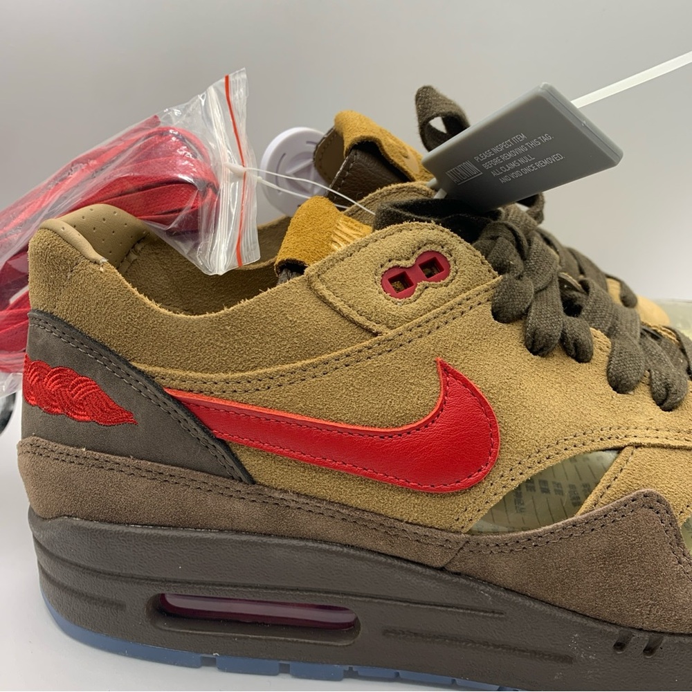 Stylish Sneakers with Red and Brown Accents - Picture 2 of 10